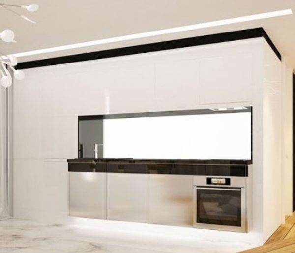 厨房设计简洁到无以复加，黑白色凌厉的线条搭配上冷硬的金属色，很好的将厨房空间设计的清爽干净。
