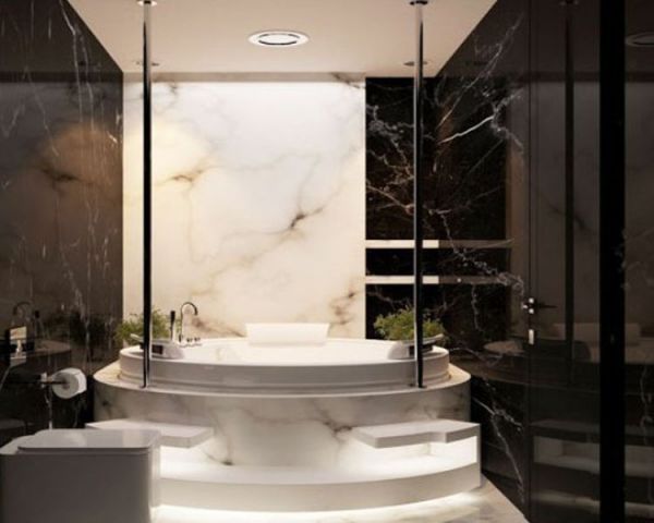 卫浴墙面一改白色风格，而是采用了黑色大理石和白色大理石相间的墙面，瞬间就将奢侈感表现的淋漓尽致。 