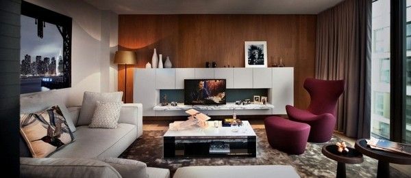 这间充满英伦设计风的公寓位于伦敦Leman大街，由设计事务所TG-STUDIO于2013年设计完成。设计的主要理念是为客户打造一个温暖、舒适的家，同时能够透露出奢华、现代的设计风格。