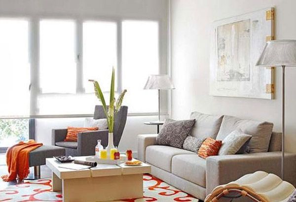 整个空间以白色为底搭配上橙色的点缀，橙色的橱柜，橙色的地毯，都给整个空间注入了青春的活力。螺旋形的楼梯，既有效节省空间，也显得较为美观。