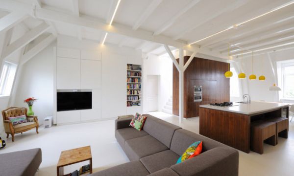 这是位于荷兰阿姆斯特丹的Weteringschans公寓，由 I Love Architecture 建筑事务所设计，简单的白色配合一种跳跃色彩的装饰风格总会那么出彩，简洁而且精致…想必屋子的主人应该是个追求简单生活，且爱米菲兔的人！