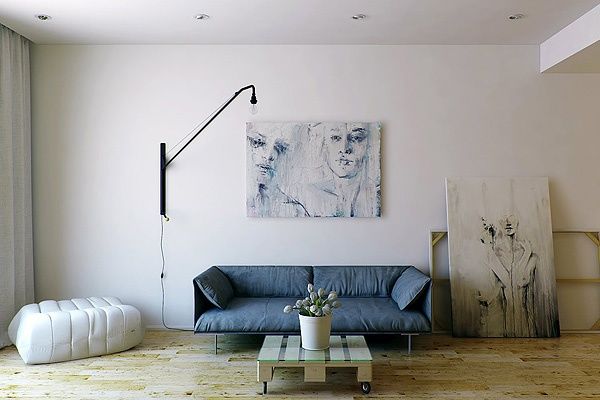 这个小公寓的室内设计大多只有使用轻木和白色油漆，十分简约。这种设计组合，营造出一种简朴无华感。