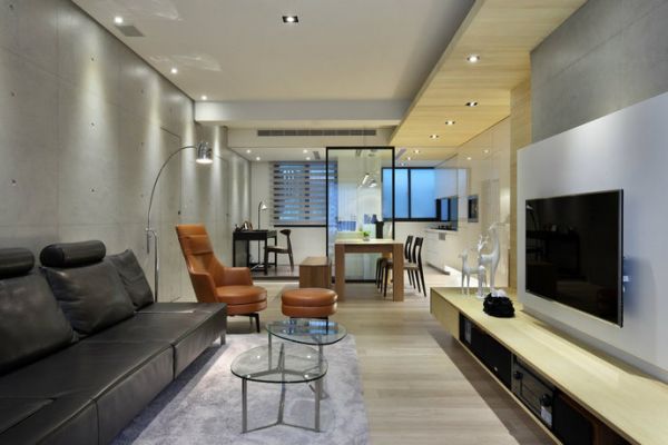 这套位于台湾新北市的公寓，是一套老屋改造的小户型。仅82平米的面积，却要满足一家三口的生活需求，简约典雅的设计风格便成为了设计师所遵循的基本理念。