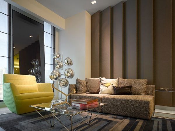 这所创意的公寓位于吉隆坡，设计师是蓝光水工作室的海德阿克曼。他代表了新一代的设计师，标新立异的风格。公寓设计根据他的时装灵感，鲜艳的色彩辅以微妙和黑白色调，代表超时代的新概念。