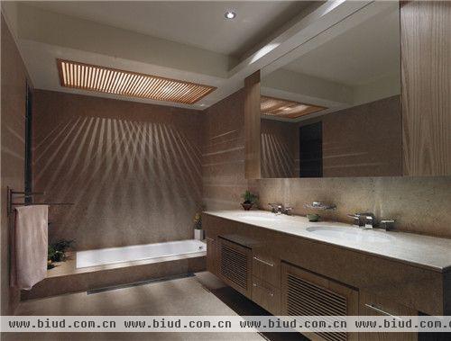 卫浴空间中的浴缸以降板式的规划为主，彷效日式汤屋的设计，延续厅区的设计语。整体设计上，运用自然媒材引申舒适的比例、颜色，安排空间自然旨趣。