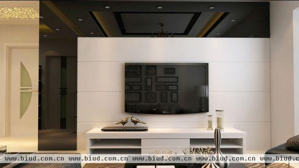 客厅电视墙，用L型的黑镜，简单时尚，美观大方。
