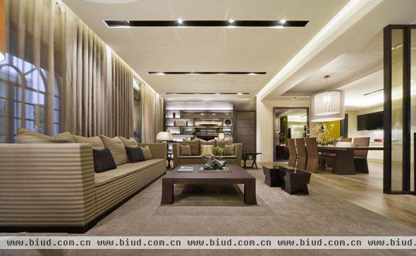 现代简约风格的客厅，天花板和背景墙大都都是采用白色调，家居都是灰色调的，和谐搭配，线条明了的客厅家居搭配使得整个空间更具现代化。
