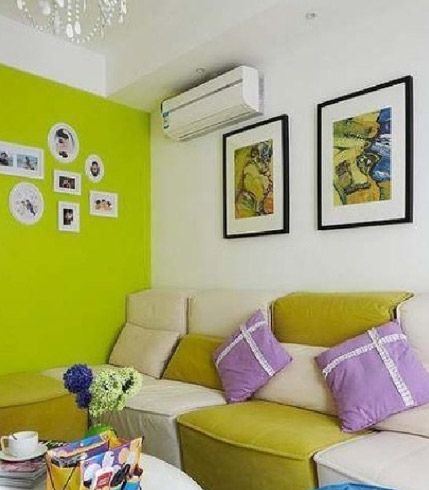 绿色的墙面使房间更多了一丝绿意，没事的时候坐在这里看看电视也绝对是一种享受。