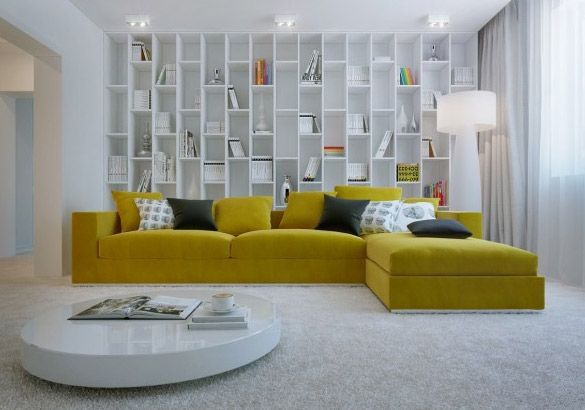 整个房间没有过多的色彩修饰，这套住宅的主打色就是黄色当然也就少不了这个主角啦，沙发后做了一个格子书架拿取方便，坐在这里看看书或是看看电视都是可以的。