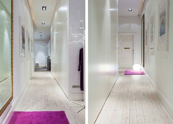 这间公寓位于瑞典斯德哥尔摩市，狭长的玄关走廊把你带到这个连着厨房的开放式客厅，从客厅可以进入两间卧室，其中一间带有卫生间。每个房间都带有硕大的窗户，使公寓的各个角落都能充分沐浴阳光。希望这间和谐典雅的北欧风格公寓能给你带来灵感！