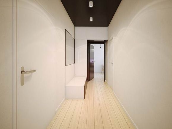 位于波兰克拉科夫的一座公寓，黑白空间素雅洁净，无需格外的色彩去点缀，仅用木质元素铺陈整个室内，简约空间带着自然气息，丝毫不觉乏闷。