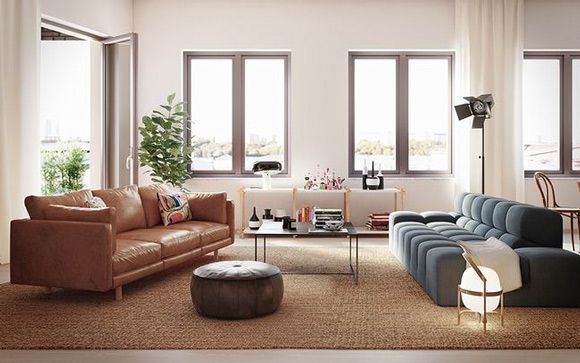 43平米的公寓，设计师选择了皮质沙发搭配另一组无扶手的绒布沙发，无产生违和感之余，与工业风的摄影棚灯混搭出摩登的时尚感。