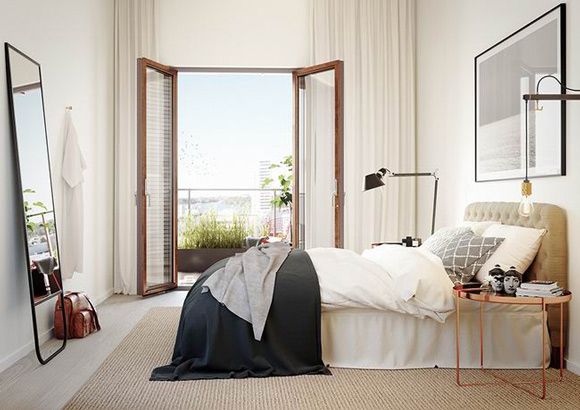 43平米的公寓，设计师选择了皮质沙发搭配另一组无扶手的绒布沙发，无产生违和感之余，与工业风的摄影棚灯混搭出摩登的时尚感。