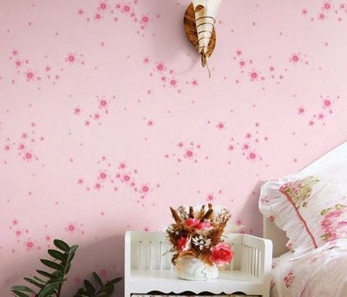 装修墙纸效果图： 浪漫的樱花背景卧室墙壁纸图片，能让许多幻想当公主的小姑娘有安稳的睡眠。