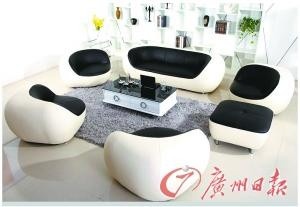 黑白配真皮沙发：如鹅卵石造型，可随意组合。